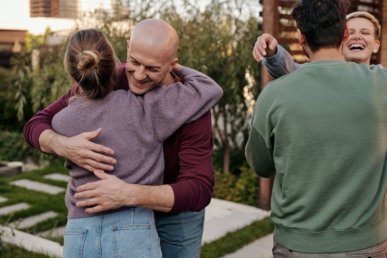support group embracing after relapse